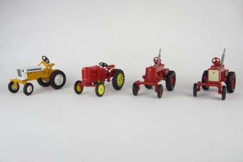 TRACTOR MODELS: Four&nbsp;scale die-cast tractor models of various manufacturers including Farmall, International, Massey-Ferguson