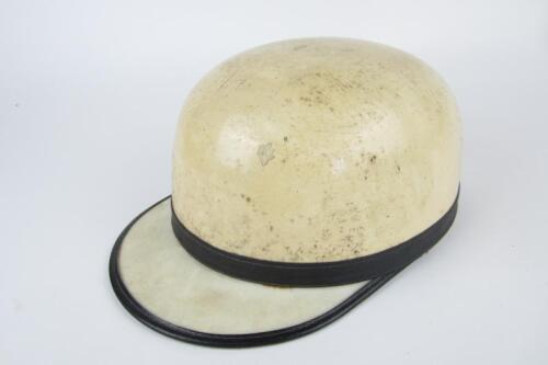 HELMET: A 1950s racing helmet with peak by Vanguard England