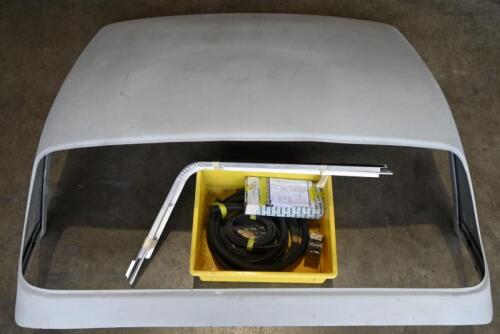TRIUMPH: A Triumph TR2/3/3A hardtop roof panel, complete with NOS rear window, rubbers and fitting kit along with new aluminium cantrails