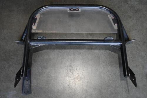 ROLL BAR: A roll bar with perspex rear windshield suited to Triumph TR3