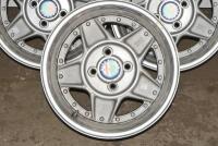 ALFA ROMEO: A set of five Simmons B-45 15 x 7.5 alloy racing wheels with Alfa Romeo livery grease cap, removed from a Montreal. Can be used on a wide range of cars - 4