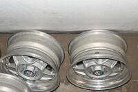 ALFA ROMEO: A set of five Simmons B-45 15 x 7.5 alloy racing wheels with Alfa Romeo livery grease cap, removed from a Montreal. Can be used on a wide range of cars - 6