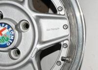 ALFA ROMEO: A set of five Simmons B-45 15 x 7.5 alloy racing wheels with Alfa Romeo livery grease cap, removed from a Montreal. Can be used on a wide range of cars - 8