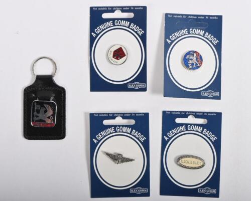 REV GOMM: A collection of four Rev Gomm badges including logos for Austin, Vauxhall, Wolseley and Hillman along with Vauxhall Chevette keychain