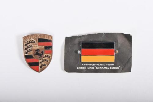 PORSCHE 901: A original Porsche 901 hood emblem badge, along with a chromium plated German flag badge.