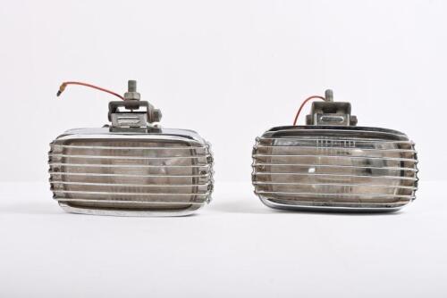 FOG LAMPS: A set of fog lamps with LR10 lens, both with chrome rear housings and front stone guards, screw thread mounts.