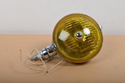 SPOTLIGHT: A vintage chrome spotlight with amber lens