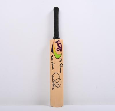 RICKY PONTING: A mini wooden Kookaburra cricket bat personally inscribed and signed by Ricky Ponting