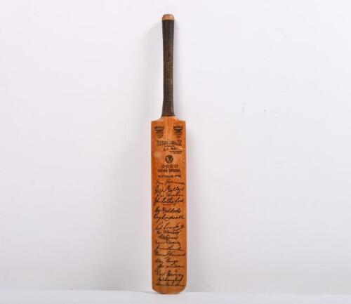 NICOLLS BAT: A miniature wooden Nicolls 'Keith Miller' autograph extra special bat with facsimile signatures of 1956 Australian team including&nbsp;including John Rutherford, Richie Bennaud, and others