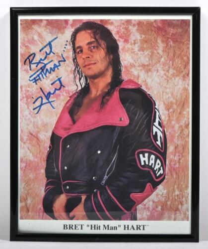 BRET HART: A framed and glazed colour picture of the 'Hit Man' autographed by Bret Hart