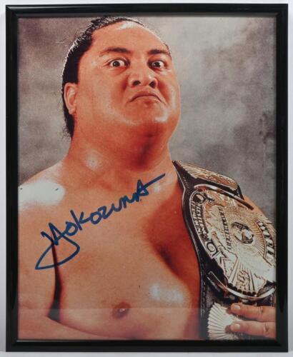 YOKOZUNA: A framed and glazed colour picture of Yokozuna, autographed by Agatupu Rodney Anoa'i