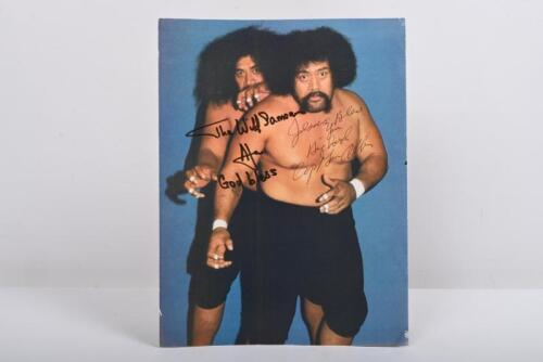 WILD SAMOANS: A colour picture featuring 'The Wild Samoan's' comprised of&nbsp;Afa Anoa'i and Sika Anoa'i, autographed by both members with personalised message