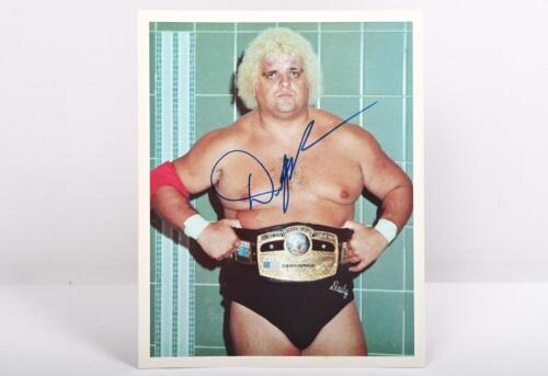 DUSTY RHODES: A colour portrait of Dusty Rhodes, autographed by Rhodes in blue marker