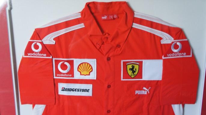 FERRARI: A Scuderia Ferrari Team shirt with photo (signed M. Schumacher ...