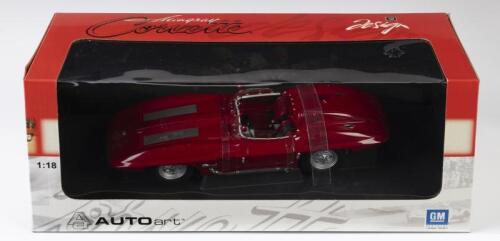CORVETTE: A NOS 1:18 scale AutoArt Corvette 1959 Stingray die-cast model with opening parts