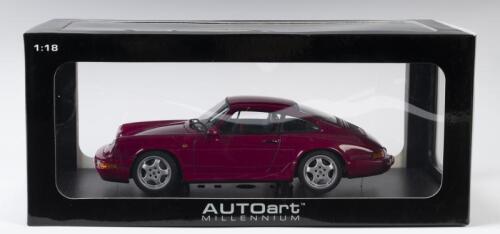 PORSCHE: A NOS 1:18 scale Autoart Millenium Porsche 911 (964) 1992 Carrera RS Rubystone Red with opening parts die-cast model
