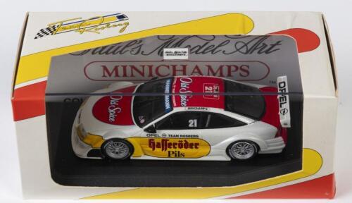 OPEL: A NOS 1:43 scale Minichamps Opel Calibra 1996 DTM H. Stuck #21 Old Spice die-cast model