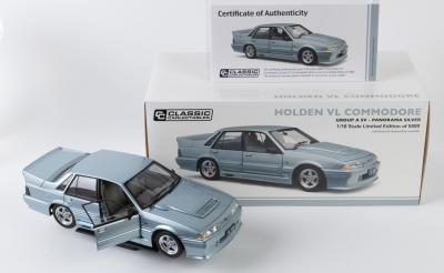 HOLDEN: A NOS 1:18 scale Classic Carlectables Holden VL Commodore Group A SV Panorama Silver die-cast model with numbered plate & opening doors & bonnet