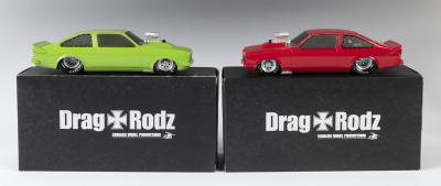 DRAG RODZ: 2 NOS Drag Rodz Outlaws Supercharged LX in Panama Green & Flamenco Red resin models approx. 17cm length