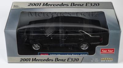 MERCEDES-BENZ: A NOS 1:18 scale Sunstar Mercedes-Benz 2001 E320 die-cast model with opening parts