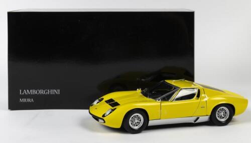 LAMBORGHINI: A NOS 1:18 scale Kyosho Lamborghini Miura P400SV Yellow/Silver die-cast model with opening parts