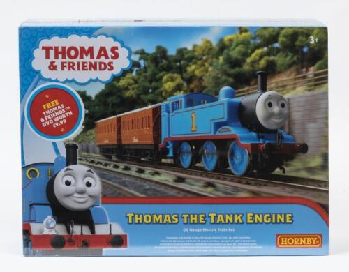 TRAIN SET: A NOS sealed Hornby Electric OO scale Thomas & Friends Train Set includes Thomas the Tank Engine Locomotive, Annie & Clarabel Wagons, Track, Power Clip, Transformer and Speed Controller