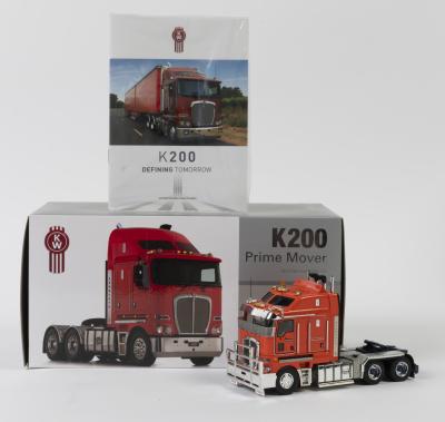 KENWORTH: A NOS 1:50 scale Drake Collectibles Kenworth K200 Orange die-cast model with opening doors & tilting cab + bullbar