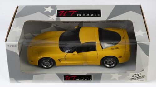 CORVETTE: A NOS 1:18 scale UT Models Corvette 2000 Coupe Millenium Yellow die-cast model with opening bonnet, doors & hatchback