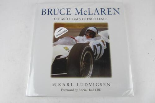 BRUCE McLAREN: 'Bruce McLaren' hardcover book by Karl Ludvigsen. Bruce McLaren signature. CoA