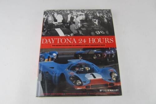 DAYTONA: 'Daytona 24 Hours' hardcover boo by J.J.O'Malley. Elford, Redman signatures.