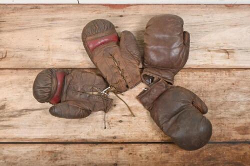 BOXING: Two pairs of vintage leather boxing gloves