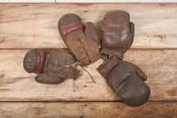 BOXING: Two pairs of vintage leather boxing gloves