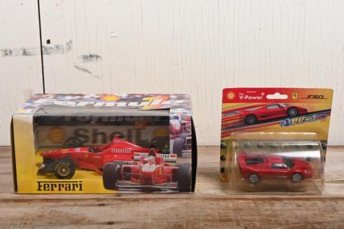 FERRARI: A Shell die cast scale model of a Ferrari F1 race car, together with a Shell 1:38 scale model of a Ferrari F50