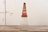 CASTROL: A Castrol 'Wakefield' embossed one imperial pint bottle with Castrol 'XL- Supergrade 30-40' red tin top