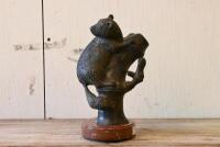 BRONZE: A cast bronze figure of a small brush tail mammal on bamboo, on a marble base, 25cm high - 2
