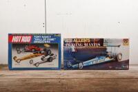 DRAGSTERS: Two dragster model kits, a Revell 1:16 scale model kit of Jeb Allen's Praying Mantis and a 1:24 scale model kit of three dragsters, completeness unknown