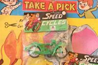 TAKE A PICK: Rare vintage unused "TAKE A PICK" with three unopened bags of 1930s/1940s plastic racing motorcycles by Speed Cycles, made in Hong Kong, cardboard has cut out animals as additional toy, good condition, great for display - 3