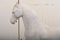 WHITE HORSE WHISKY: An early 20th century White Horse Whisky painted chalkware point of sale advertising figure of a horse, heavily restored around the body, and front legs, crack to rear leg, one ear chipped, 42cm high - 2