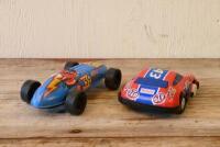 JAPANESE TIN CARS: Two Japanese lithograph printed friction powered tin model cars, longest 14cm long - 2