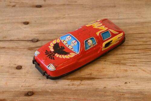 JAPANESE TIN CAR: A circa 1960s Japanese lithograph printed tin race car, 14cm long