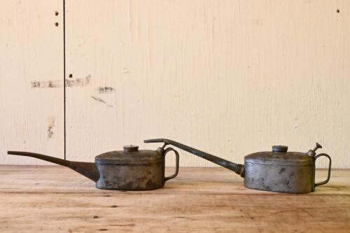 REGA: Two vintage "Rega" 1/2 pint oilers