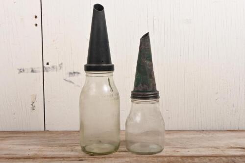 OIL BOTTLES: Two oil bottles, a one litre bottle with plastic pourer and a one pint with tin pourer