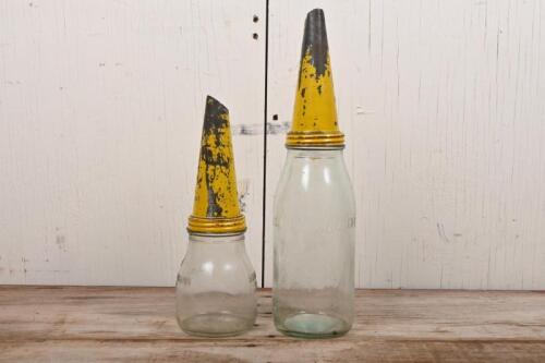 OIL BOTTLES: A one imperial quart and a 500ml oil bottle, both with yellow painted tin pourers