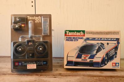 FORD: A Tamiya 1:24 scale remote controlled model of a Ford Mustang Probe GTP and a Tamtech 201 remote control necessary to control the model