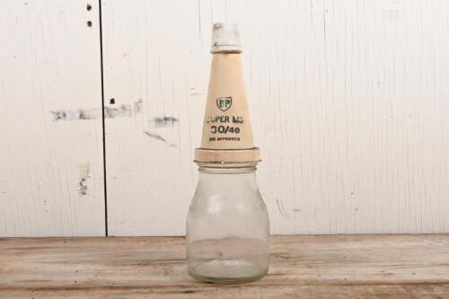 BP: A one pint oil bottle with Bp "Super MS 30/40" plastic pourer and lid