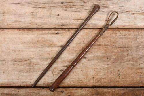 WHIP HANDLES: Two early Australian whip handles, including one fiddleback blackwood handle with leather tip, longest 44cm long