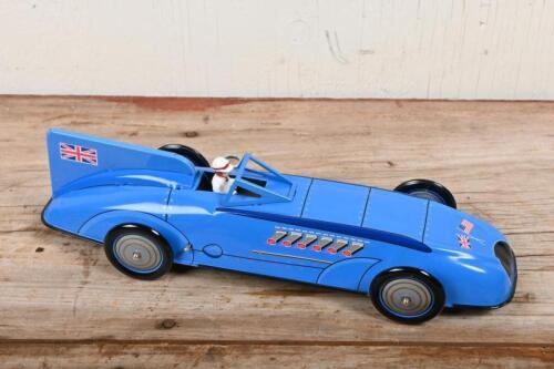 BLUEBIRD: A reproduction wind up tin toy of 'Sir Ian's Bluebird land speed record car by Schylling toys, with box