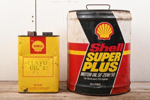 SHELL: Two Shell tins including a one gallon 'Clavus oil 33' tin and a Shell Super Plus motor oil 20 litre drum
