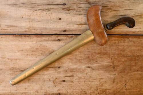 JAVANESE DAGGER: A impressive antique Javanese Kris Dagger with carved wood handle and wood/brass sheath