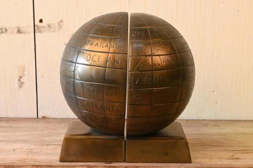 BOOKENDS: A pair of world globe form bookends, 22.5cm high